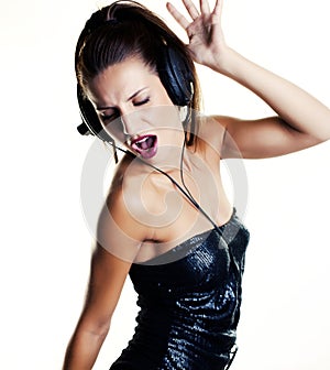 woman in disco dancing with headphones