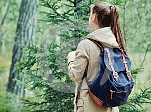 Woman discovering nature in the forest environment, lifestyle co