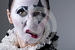 Woman in disguise harlequin photo