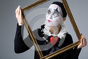 Woman in disguise harlequin photo
