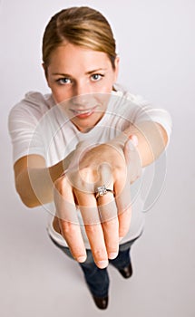 Woman displaying engagement ring