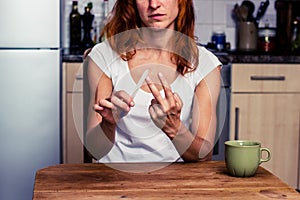 Woman displays obscene gesture