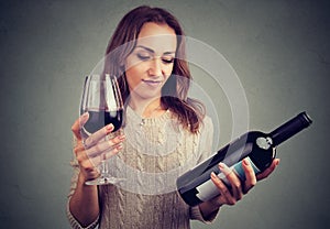 Woman displeased with wine taste