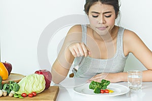Woman do not want to eat vegetables and dislike taste of broccoli