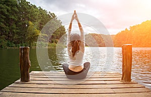 Woman do yoga outdoor. Woman exercising yoga