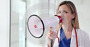 Woman doctor announces information using loudspeaker