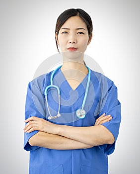 Woman doctor with blue lab coat and stethoscope