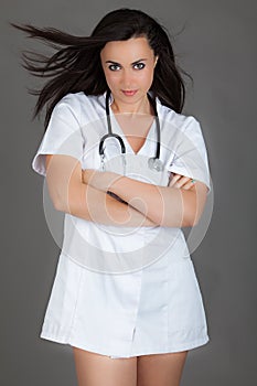 Woman doctor on grey background medical staff personell nurse