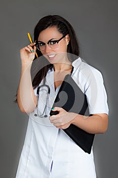 Woman doctor on grey background medical staff personell nurse