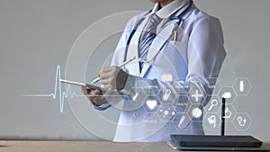 Woman doctor holding digital pencil and touching screen on smart device