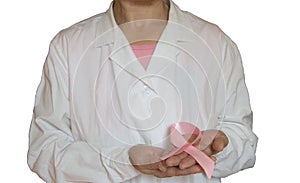 Woman doctor holding in his hand a pink ribbon, , concepts of health awareness breast cancer
