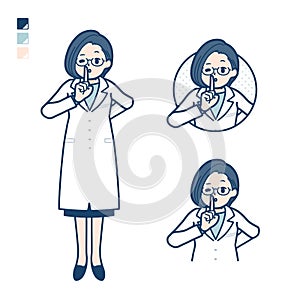 A woman doctor in a lab coat with be quiet hand sign images