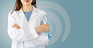 Woman doctor with lab coat and stethoscope