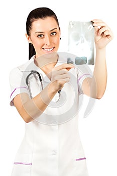 Woman doctor is looking roentgenogram photo