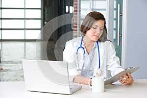 Woman doctor in a modern office