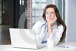 Woman doctor in a modern office