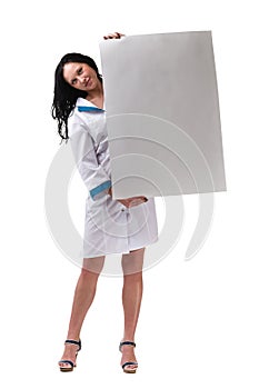 Woman doctor or nurse showing empty blank