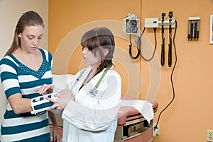 Woman Doctor and Patient with Broken Arm