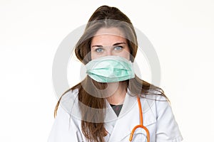 Woman doctor puts on surgery mask protective coronavirus