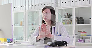 Woman doctor showing negative gesture at clinic reception 4k movie slow motion
