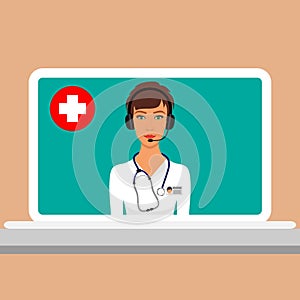 Woman doctor with a stethoscope around her neck and headphones with a microphone on the head on laptop screen. Online medical cons
