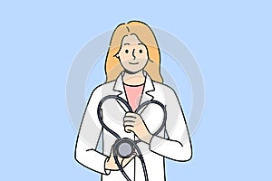 Woman doctor with stethoscope in hands, urging to undergo preventive medical examination in clinic
