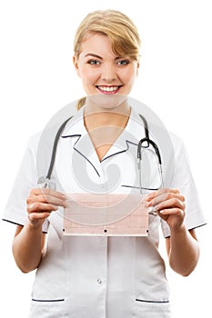 Woman doctor with stethoscope holding electrocardiogram graph, healthcare concept