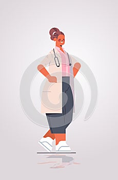 woman doctor in uniform professional medical worker standing pose medicine healthcare concept