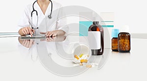 Woman doctor use digital tablet at the desk office with pills, drugs and medicine bottles, medical care concept, web banner