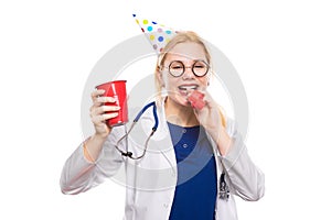 Woman doctor in white coat with party stuff