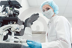 Woman doctor working in medical lab