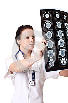 Woman doctor with x-rays of brain photo