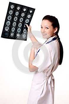 Woman doctor with x-rays of brain photo