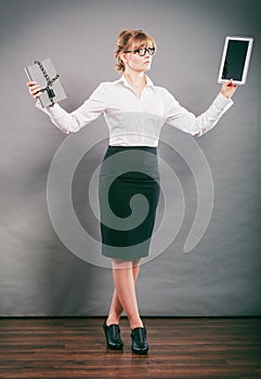 Woman with document and tablet. Digital storage.