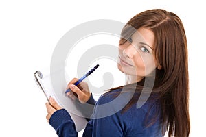 Woman does records by pen in notepad