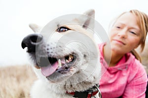 Woman and dog akita