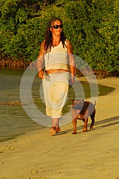 Woman and dog in Caribbean