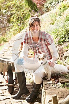 Woman With Dog Having Coffee Break