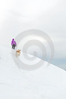 Woman and dog hiking, Karkonosze Mountains, Poland