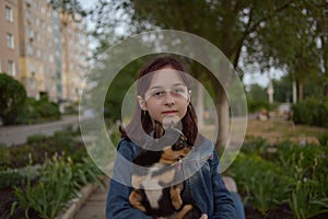 Woman and dog. Outside, happy. theme is the friendship of man and animal. Girl with chihuahua. young woman and her dog