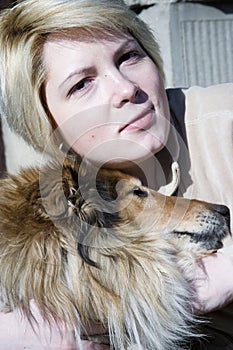 Woman and dog pet