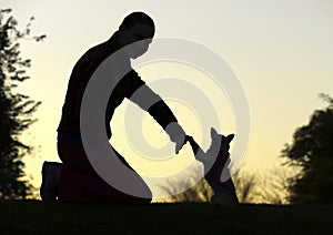 Woman and Dog`s Silhouette