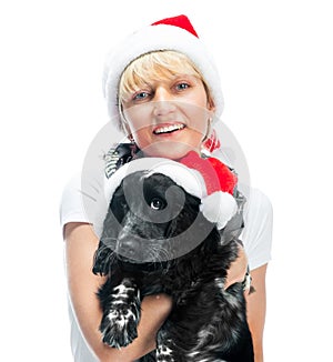 Woman and dog in santa hats