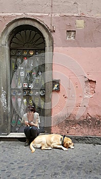 Woman and dog, Trastevere, Rome, Italy