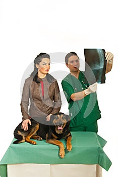 Woman with dog at vet office