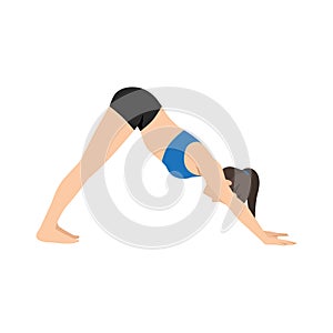 Woman doing Adho mukha svanasana or downward facing dog