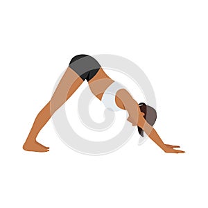 Woman doing Adho mukha svanasana or downward facing dog yoga pose