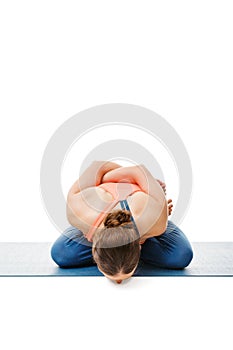 Woman doing asana Yoga mudrasana