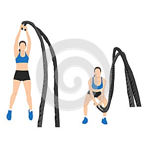 Woman doing battle rope double arm slams exercise