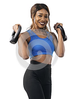 Woman doing bicep curls with kettlebell over white